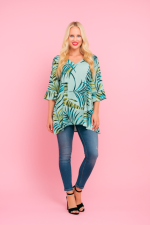 Flowy aqua green long blouse with tropical palm leaf print, made from 100% plant-based viscose and designed in Bali.